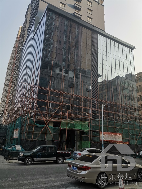 為什么現(xiàn)代建筑用玻璃幕墻？
